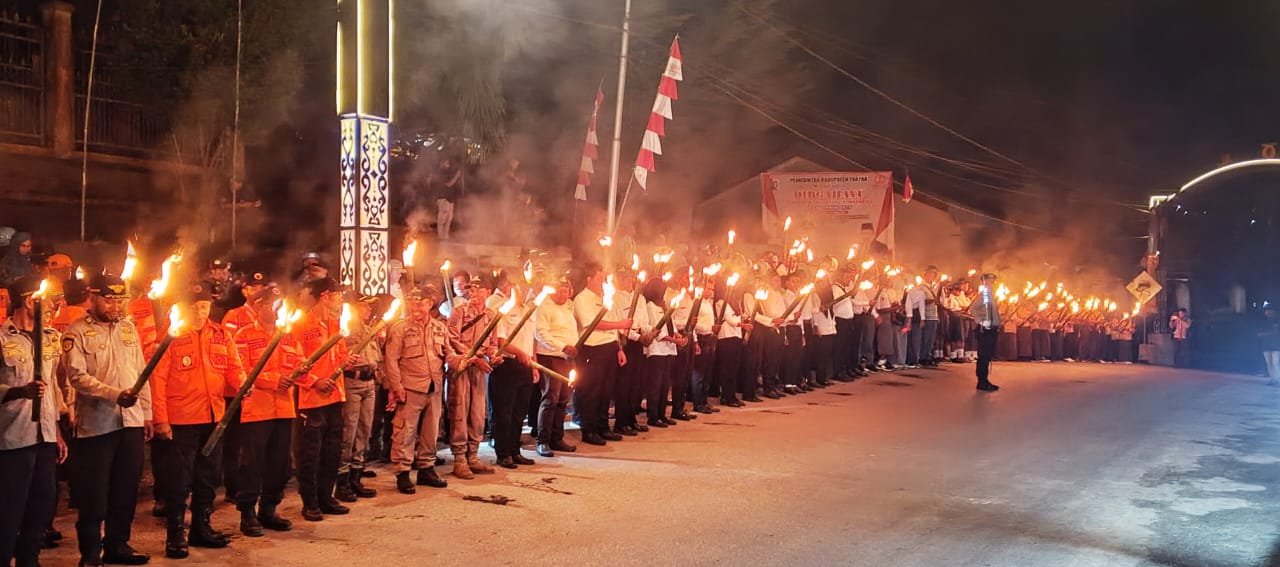 Polres Fakfak Gelar Upacara Taptu dan Pawai Obor Peringati HUT ke-80 Kemerdekaan RI