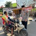 Ramadan Penuh Berkah, Polres Merauke dan Bhayangkari Berbagi Takjil kepada Pengguna Jalan